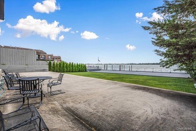 Set behind private gates on an oversized waterfront parcel, this - photo 33