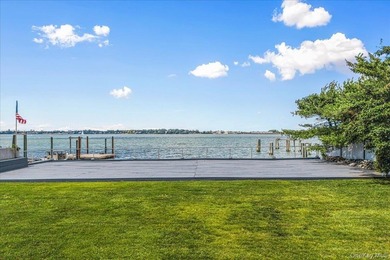 Set behind private gates on an oversized waterfront parcel, this - photo 34