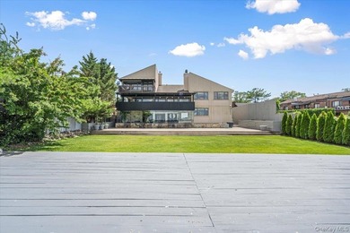 Set behind private gates on an oversized waterfront parcel, this - photo 35