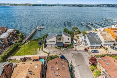 Set behind private gates on an oversized waterfront parcel, this - photo 36