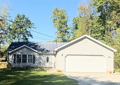 Lake Roaming Rock Home For Sale in Roaming Shores Ohio