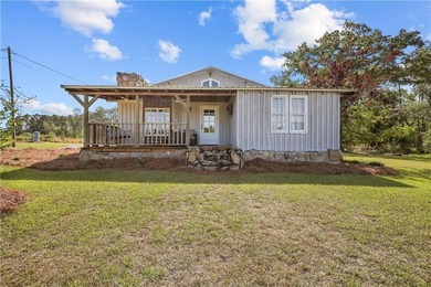 This Baxley property opens the door to something you don't come - photo 2