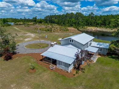 This Baxley property opens the door to something you don't come - photo 3