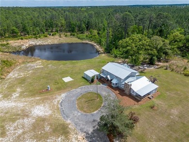 This Baxley property opens the door to something you don't come - photo 4
