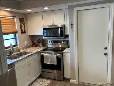 $7,500 NEW PRICE REDUCTION! Beautiful VILLA on the CANAL with - photo 12