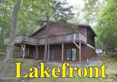 Enjoy breathtaking lake views from this 3-bedroom, 2-bath - photo 1