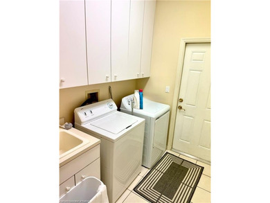 Live where you play! Large 3/2/2 POOL HOME located directly on a - photo 22