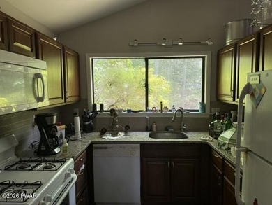Enjoy breathtaking lake views from this 3-bedroom, 2-bath - photo 4