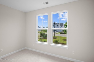 The Cherry Grove model offers a spacious and inviting retreat - photo 5