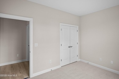 The Cherry Grove model offers a spacious and inviting retreat - photo 6