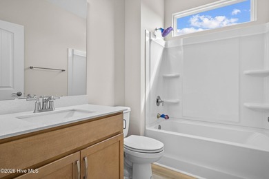 The Cherry Grove model offers a spacious and inviting retreat - photo 7
