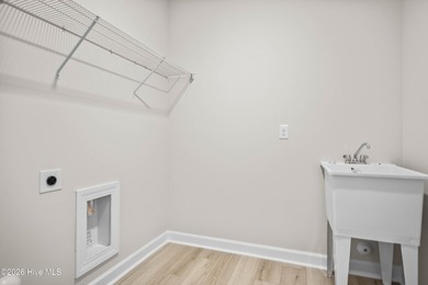 The Cherry Grove model offers a spacious and inviting retreat - photo 9