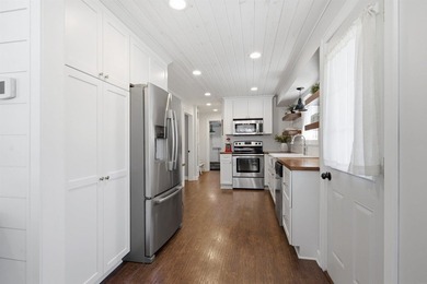 Step into the opportunity to own a beautifully restored classic - photo 10