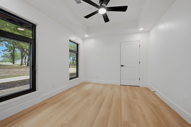 Set on 11 gently rolling acres in Sadler, TX, this beautifully - photo 7