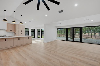Set on 11 gently rolling acres in Sadler, TX, this beautifully - photo 9