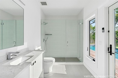 This newly constructed modern residence offers stunning - photo 10