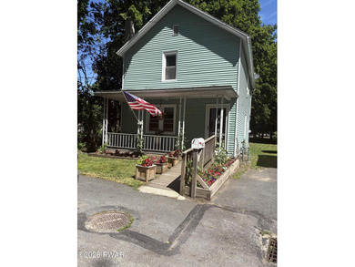 Welcome home to this well-maintained 2-bedroom, 1.5-bath - photo 1