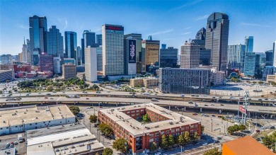 Rare opportunity to own an extensively updated loft style condo