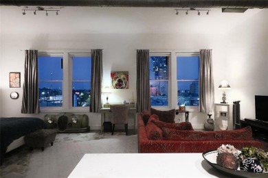 Rare opportunity to own an extensively updated loft style condo