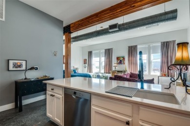 Rare opportunity to own an extensively updated loft style condo