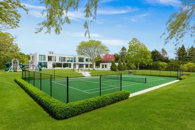 Set on 2.29 landscaped acres on one of the area's most coveted - photo 3