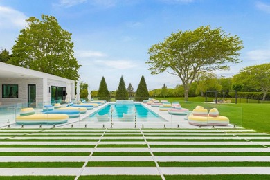 Set on 2.29 landscaped acres on one of the area's most coveted - photo 5