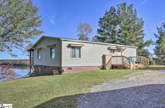 Where do you even begin describing this gorgeous property and - Lake Home Sale Pending in Hodges, South Carolina