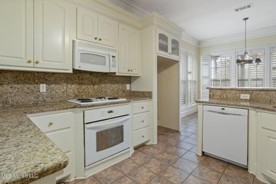 This charming brick-front home in the exclusive gated community - photo 11