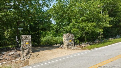 Pass through the gated entrance of Triple K Ranch & experience - photo 12