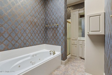 This charming brick-front home in the exclusive gated community - photo 15