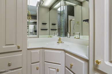 This charming brick-front home in the exclusive gated community - photo 16