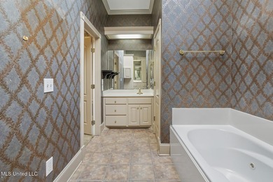 This charming brick-front home in the exclusive gated community - photo 18