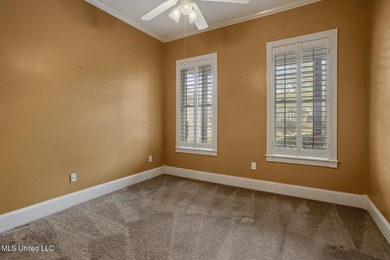 This charming brick-front home in the exclusive gated community - photo 20