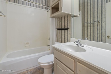 This charming brick-front home in the exclusive gated community - photo 21
