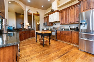 Welcome to Redlands Mesa Golf Course Community. Perched above - photo 7