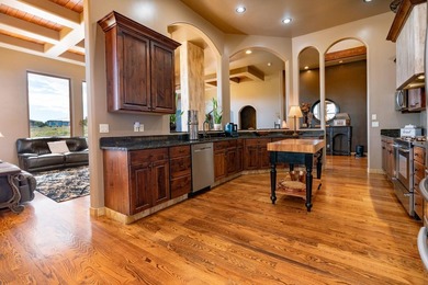 Welcome to Redlands Mesa Golf Course Community. Perched above - photo 8
