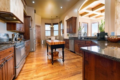 Welcome to Redlands Mesa Golf Course Community. Perched above - photo 9