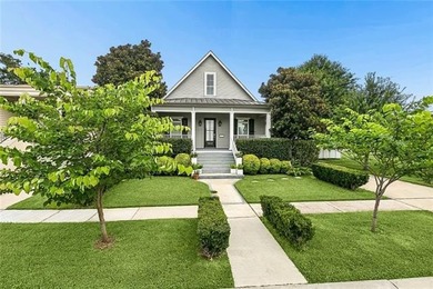 Charming Raised Cottage. Step inside to an open-concept living - photo 1