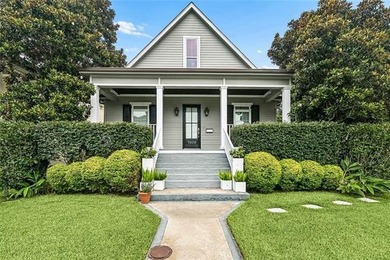 Charming Raised Cottage. Step inside to an open-concept living - photo 2