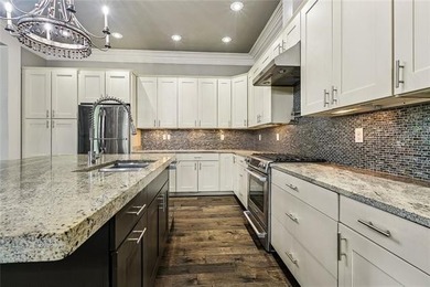 Charming Raised Cottage. Step inside to an open-concept living - photo 6