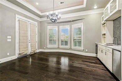 Charming Raised Cottage. Step inside to an open-concept living - photo 8