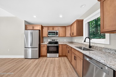 Experience the best of Lake Wallenpaupack living in this - photo 4