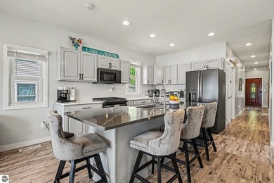 Enjoy effortless lakefront living in this completely remodeled - photo 12
