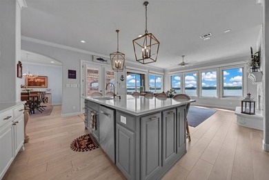 Wow, a breathtaking open-water lakefront home in the highly - photo 16