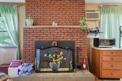 Enjoy lake living with this charming 2-bedroom, 1-bath home - photo 9