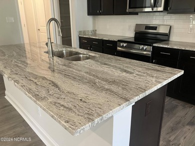 This is Adams Homes MODEL HOME in Fairfield Harbour. This is a - photo 16