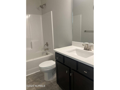 This is Adams Homes MODEL HOME in Fairfield Harbour. This is a - photo 25
