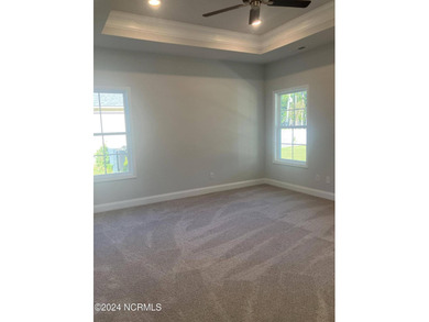 This is Adams Homes MODEL HOME in Fairfield Harbour. This is a - photo 27