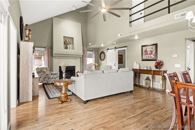 Discover this immaculate 2nd-tier ranch in Linn Creek, boasting - photo 12