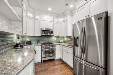 Beautifully upgraded, modern coastal home with new roof, new - photo 17